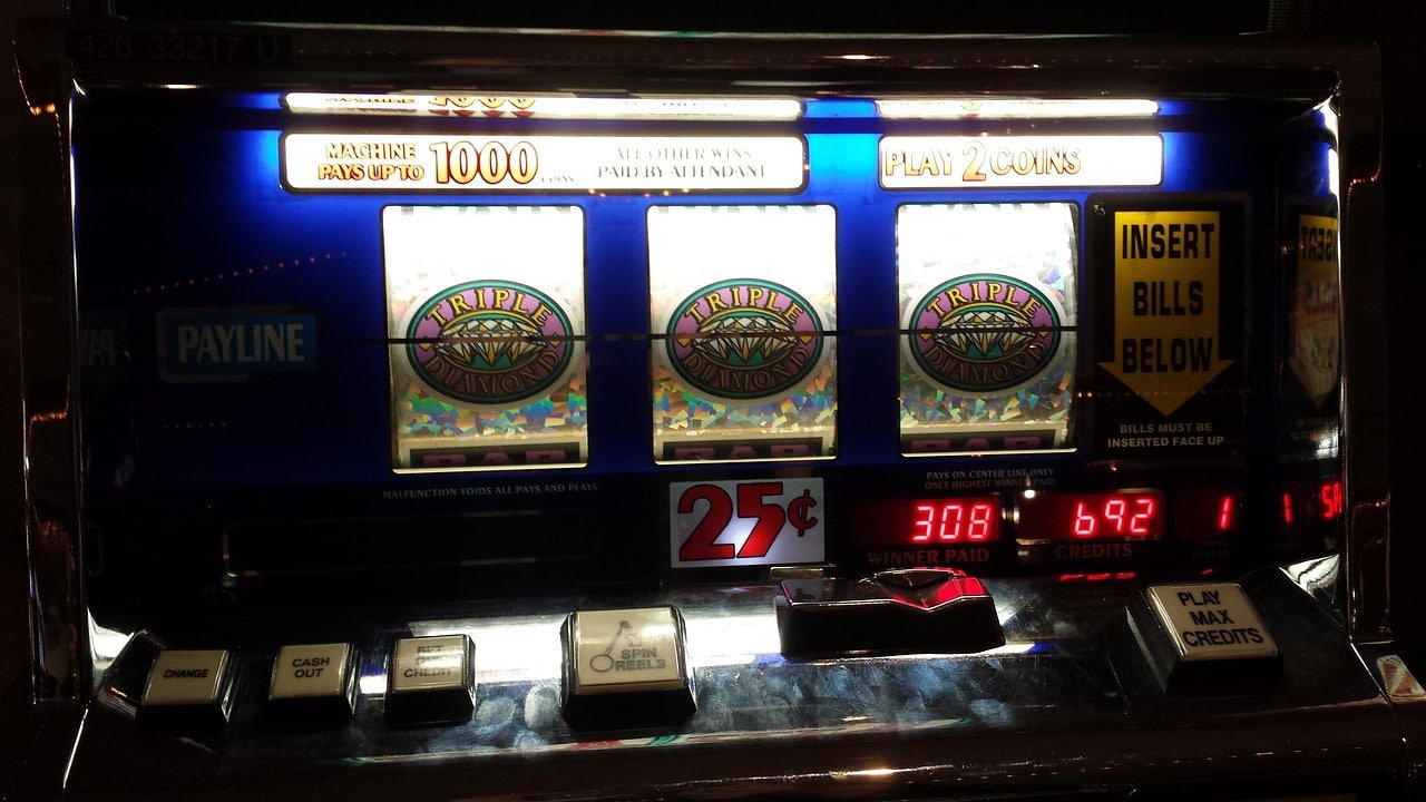 Filipino mobile user playing dmjili slot games on a smartphone at home